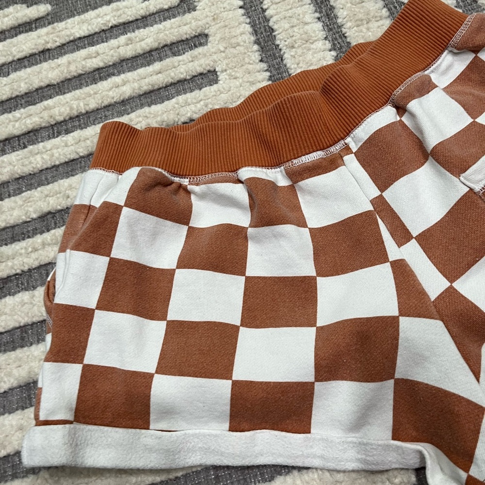 Out from under checkered shorts - Picture 9 of 11
